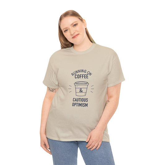 Coffee Lover Graphic T-Shirt | Running on Coffee & Cautious Optimism | Model Wearing Shirt 2 | FRONT MODEL | Sand